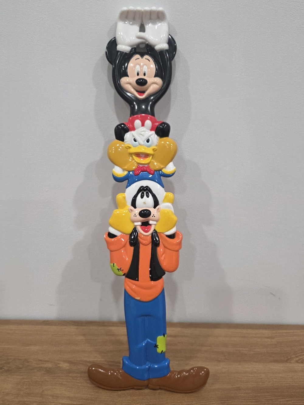 Vintage Walt Disney World plastic back scratcher shaped like a character totem p